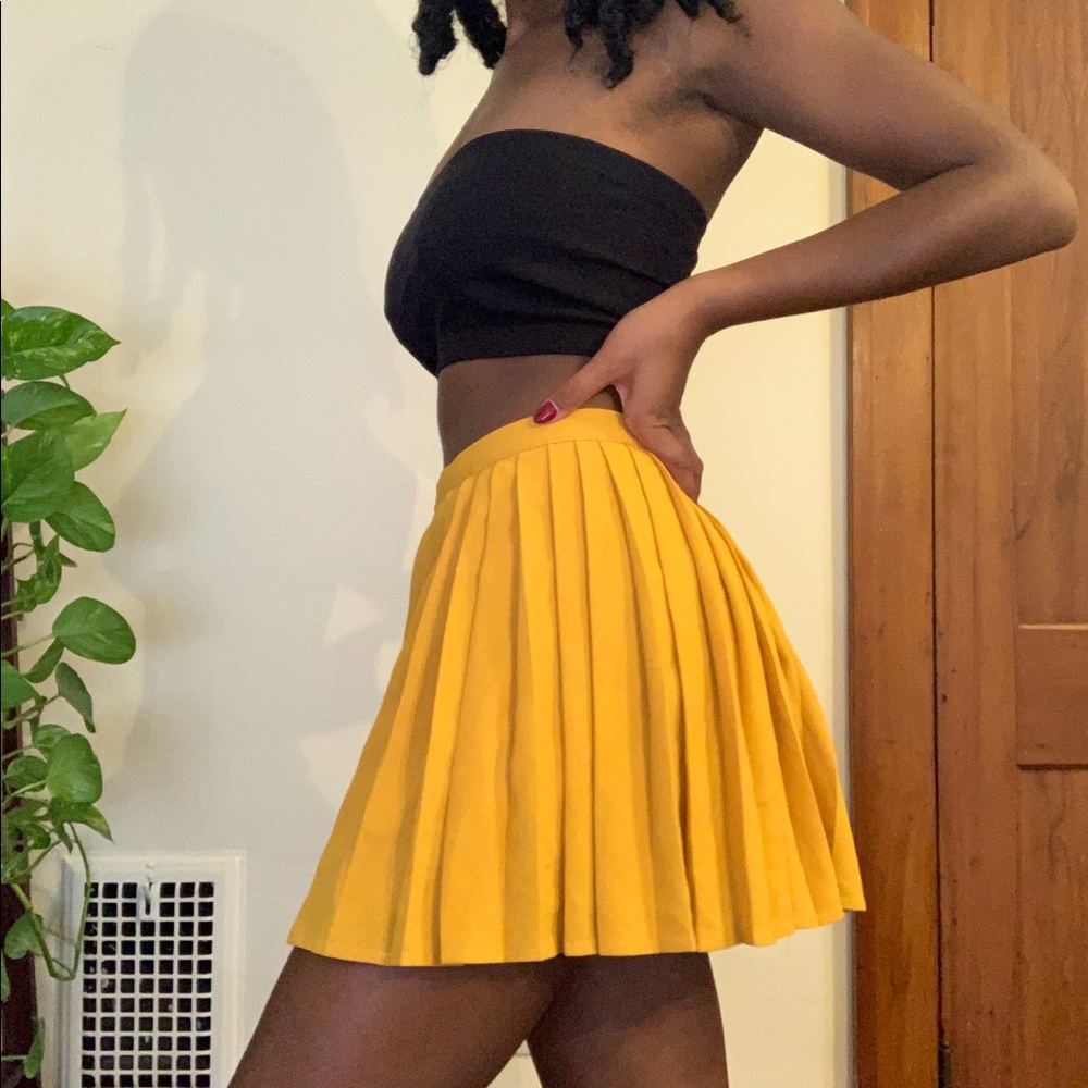 yellow pleated tennis skirt